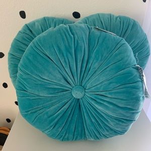 Teal button pillow